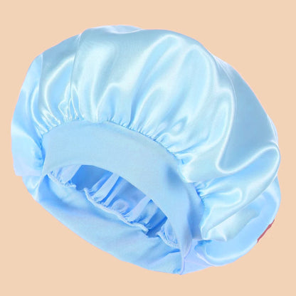 Satin Wide-Brim Shower Bonnet
قبعة استحمام ساتان واسعة
